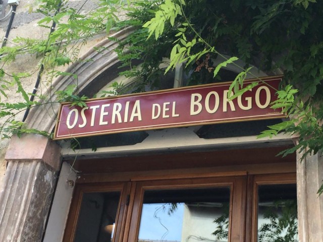 osteria del borgo insegna